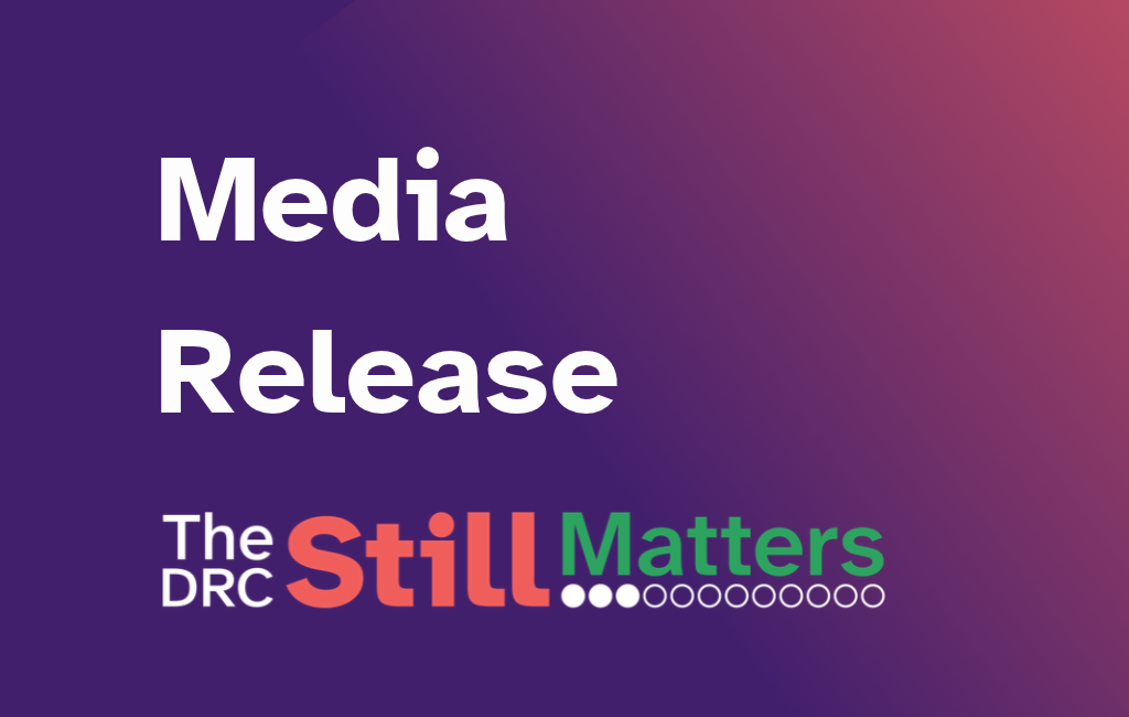 Purple background. Text says Media Release. The DRC Still Matters campaign logo is below it.